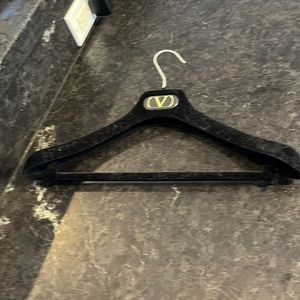 Valentino black velvet hanger.